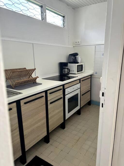 Kuchyň nebo kuchyňský kout v ubytování Maison authentique à 300m de la plage