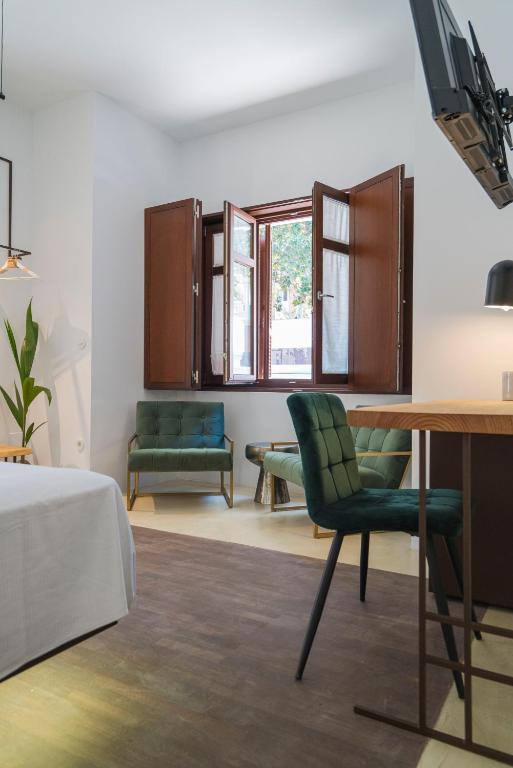 Posezení v ubytování La Moderna Suites