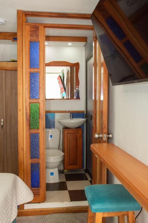 Koupelna v ubytování Habitación La Amelia