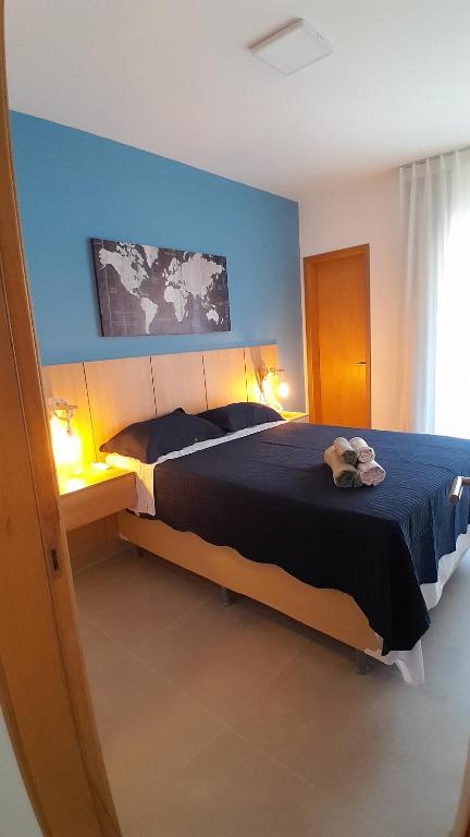 Postel nebo postele na pokoji v ubytování Village em Itacimirim lindo, novo e tranquilo à 400 m da Praia da Espera