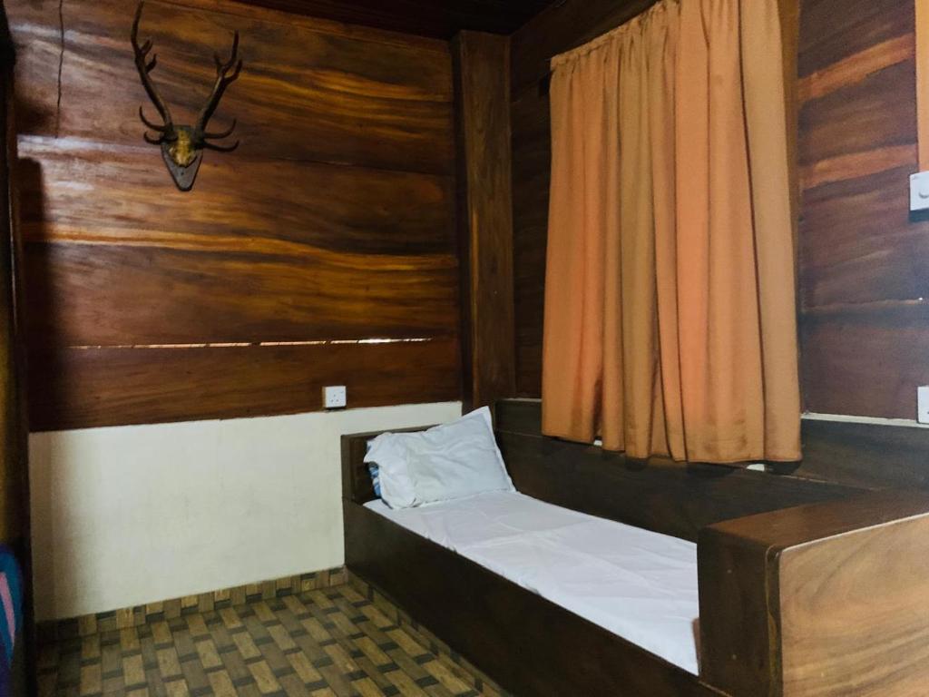 Postel nebo postele na pokoji v ubytování Shim Beach Resort