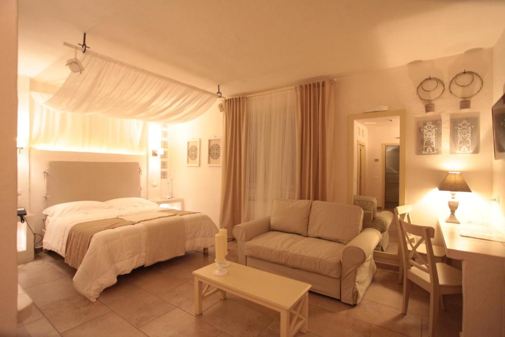 Postel nebo postele na pokoji v ubytování Relais in Contrada