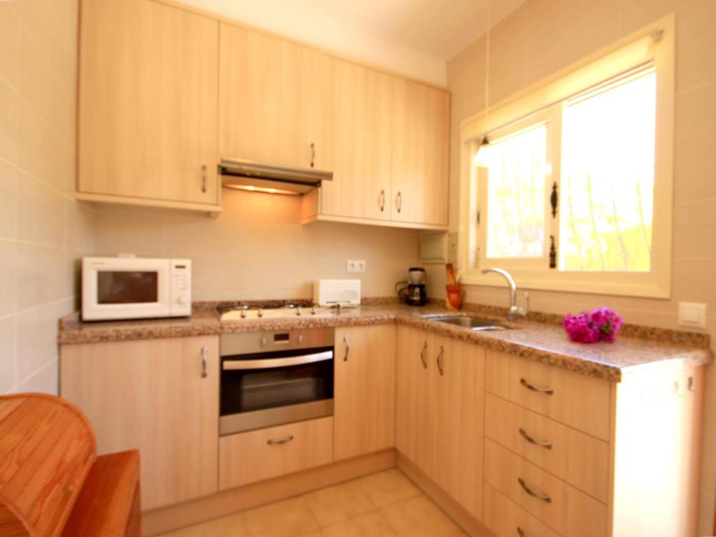Kuchyň nebo kuchyňský kout v ubytování Villa Marycar