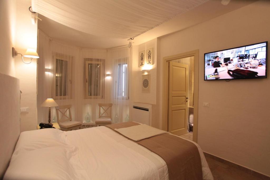 TV a/nebo společenská místnost v ubytování Relais in Contrada