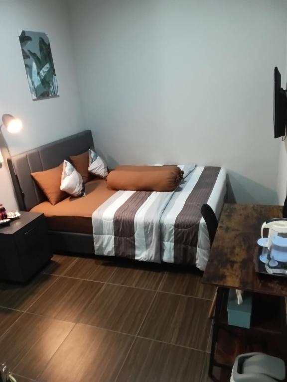 Postel nebo postele na pokoji v ubytování 24StaycationHome