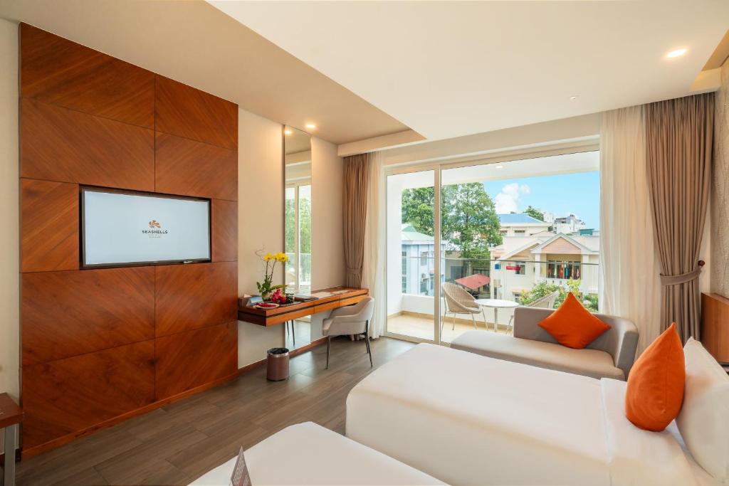 Uma cama ou camas num quarto em Seashells Phu Quoc Hotel & Spa