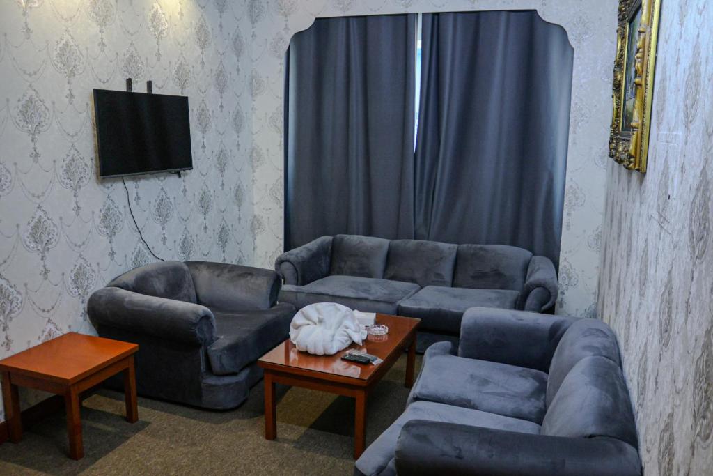 Posezení v ubytování BOONMAX Hotel
