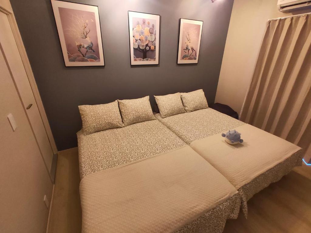 Postel nebo postele na pokoji v ubytování 豆インMaMe Inn