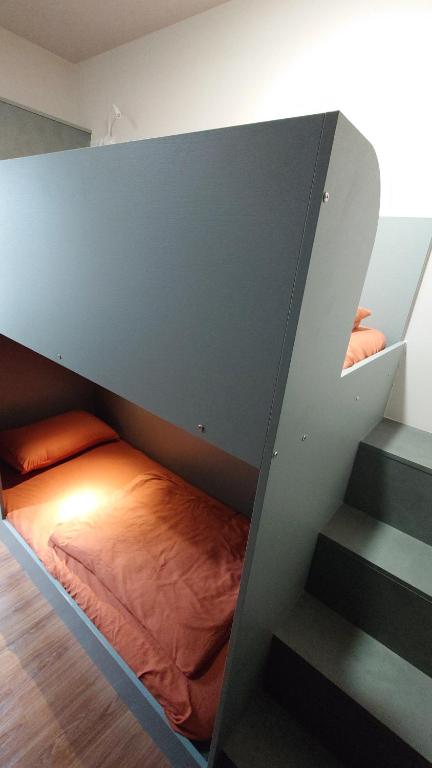 Postel nebo postele na pokoji v ubytování Formosa 101