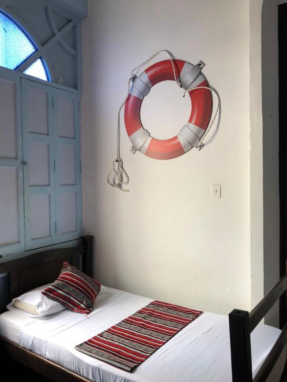 Postel nebo postele na pokoji v ubytování Casona Don Juan Hostel