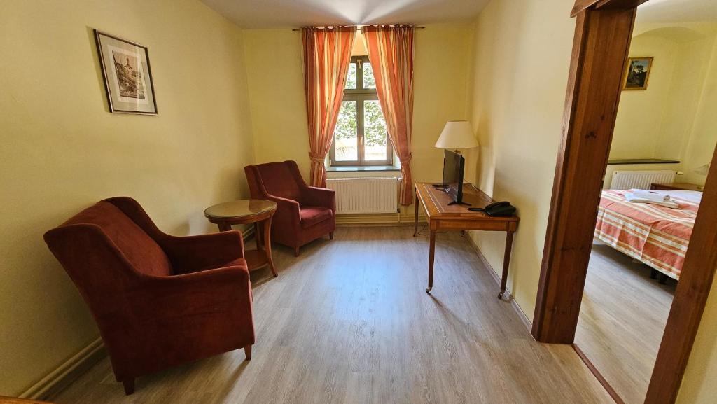 Postel nebo postele na pokoji v ubytování Hotel Opat