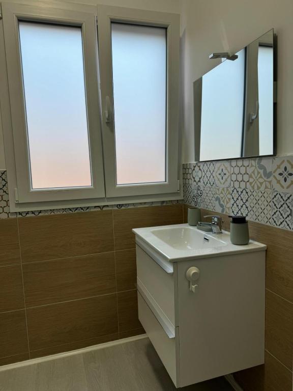 Koupelna v ubytování Avi Rooms