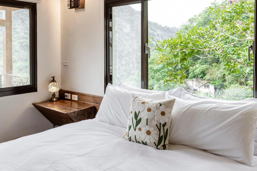 Postel nebo postele na pokoji v ubytování Shan Xing Ji Ye Homestay