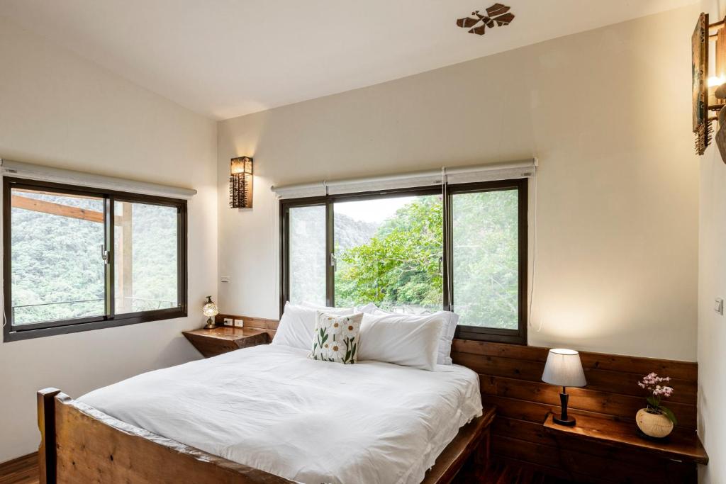 Postel nebo postele na pokoji v ubytování Shan Xing Ji Ye Homestay