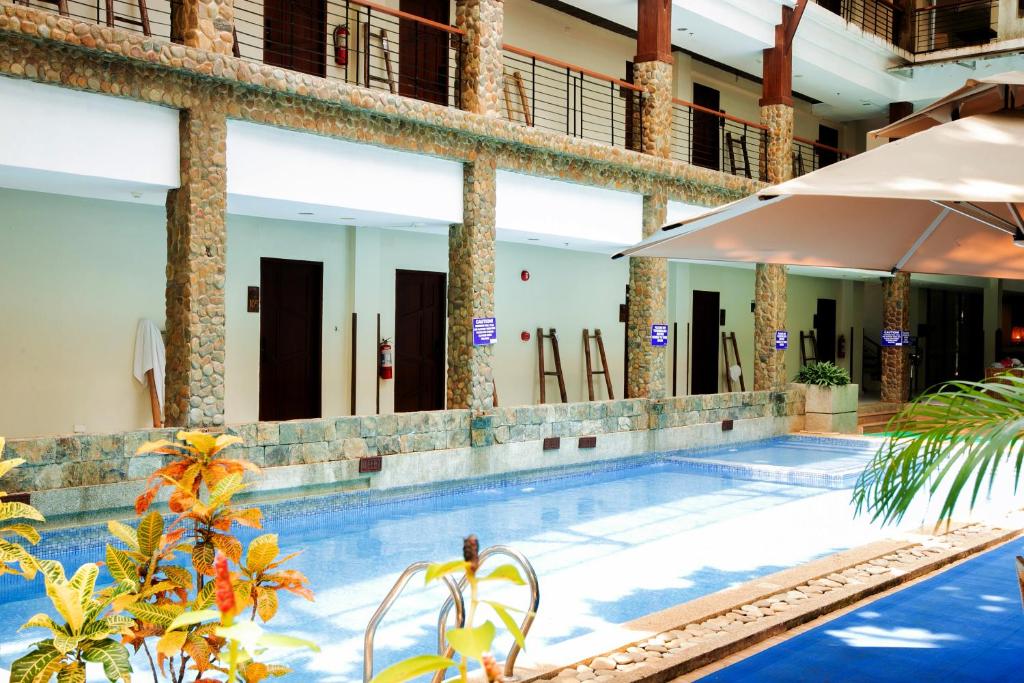 Bazén v ubytování Marianne Hotel nebo v jeho okolí