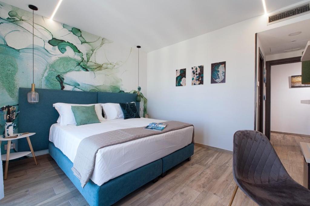Postel nebo postele na pokoji v ubytování LuMar Luxury Sorrento