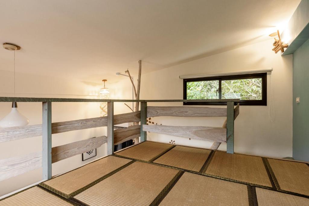 Postel nebo postele na pokoji v ubytování Shan Xing Ji Ye Homestay
