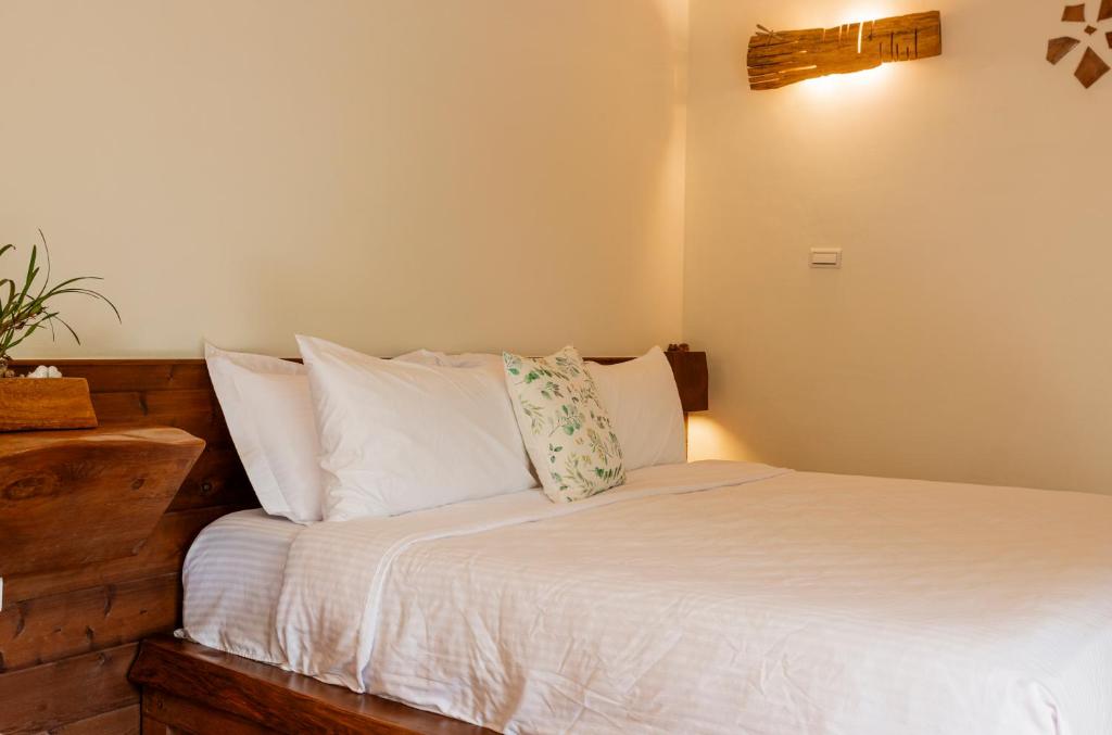 Postel nebo postele na pokoji v ubytování Shan Xing Ji Ye Homestay