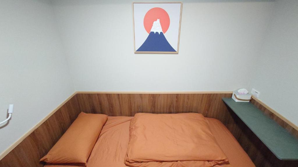 Postel nebo postele na pokoji v ubytování Formosa 101
