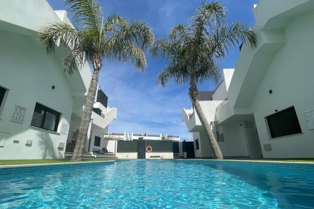 Swimmingpoolen hos eller tæt på Penthouse Atico Cálida