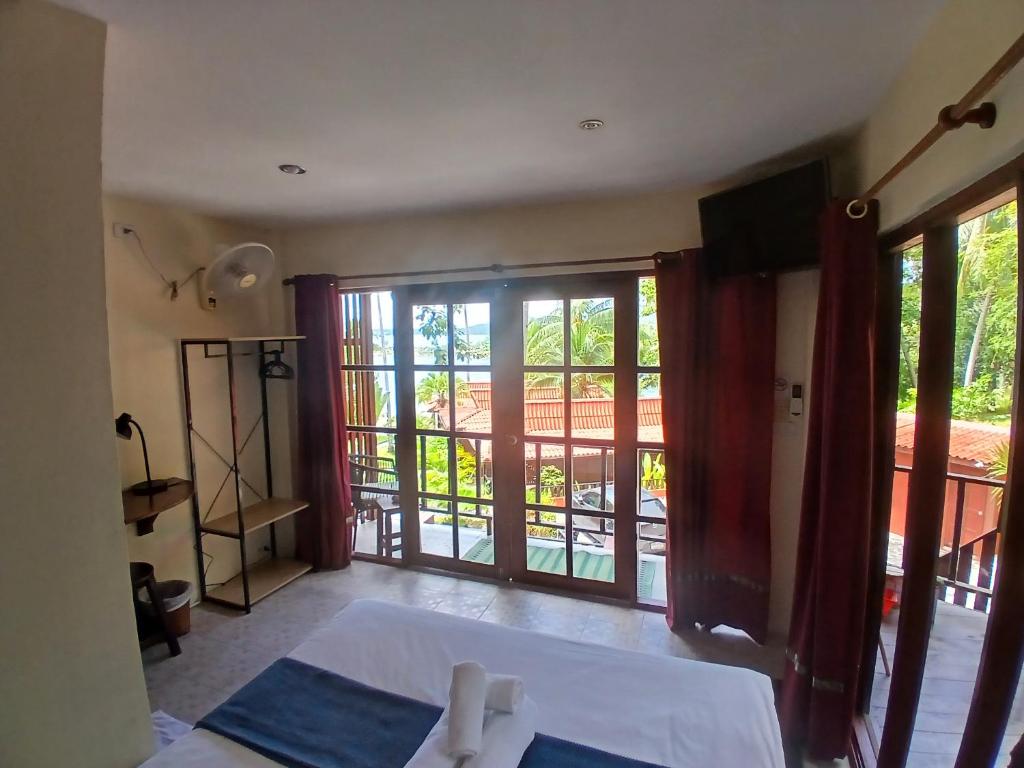 Postel nebo postele na pokoji v ubytování Cyana Resort