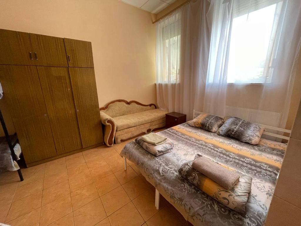 Postel nebo postele na pokoji v ubytování Готель BonRe