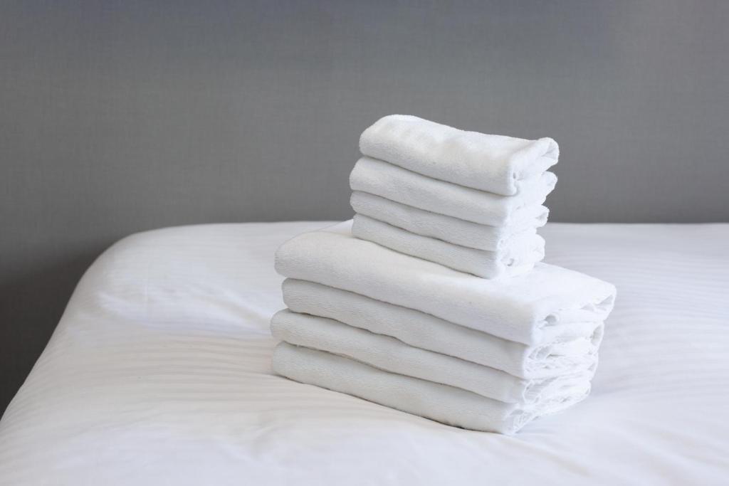 Postel nebo postele na pokoji v ubytování Residence Hotel Hakata Minoshima