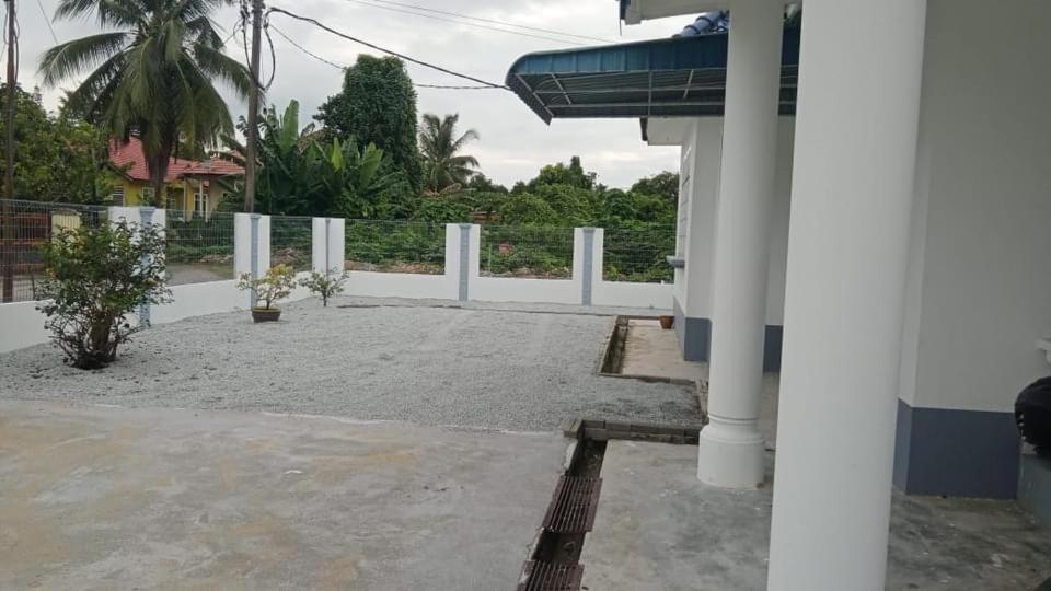 Κήπος έξω από το Homestay Kak Pah Kota Bahru