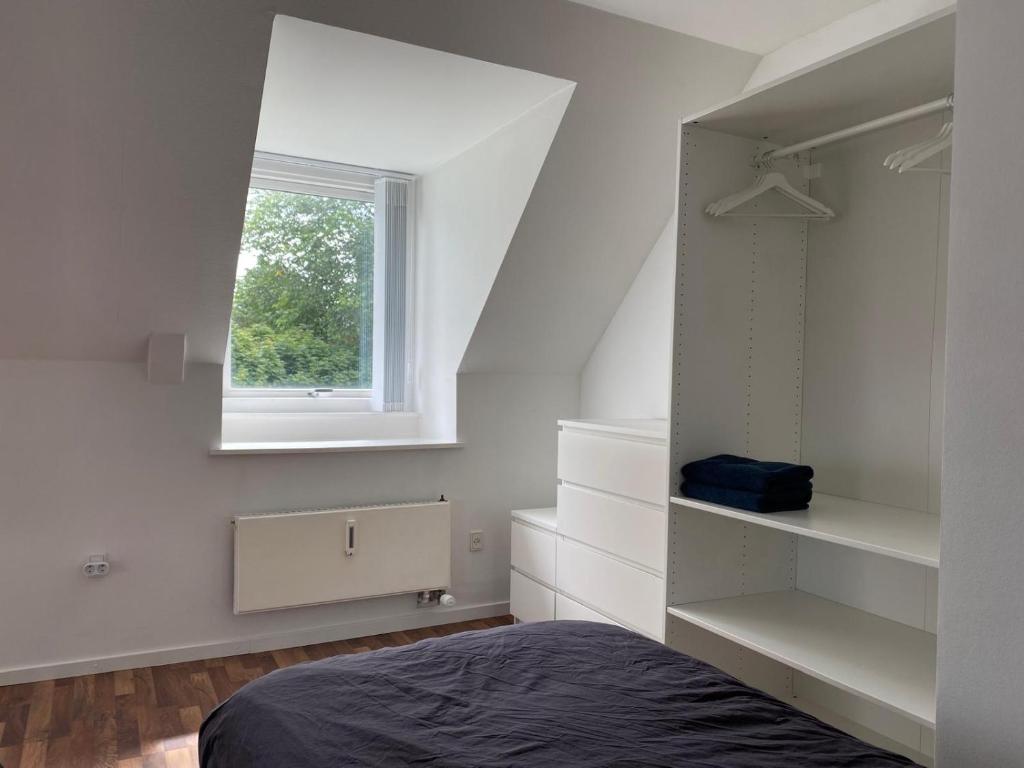 Postel nebo postele na pokoji v ubytování Renovated apartment