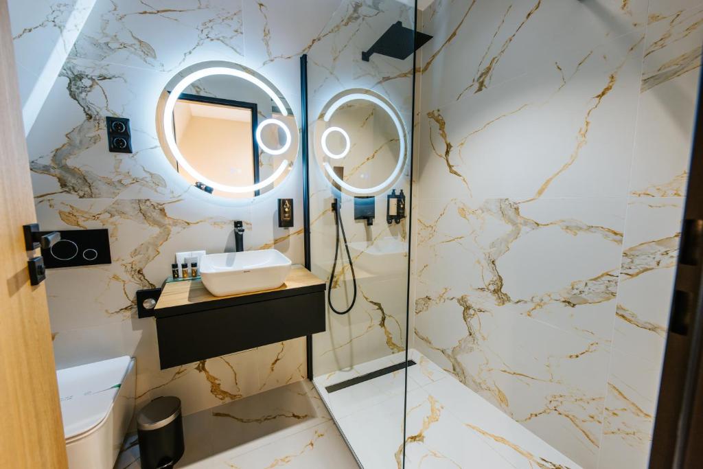 Koupelna v ubytování Hotel Auris