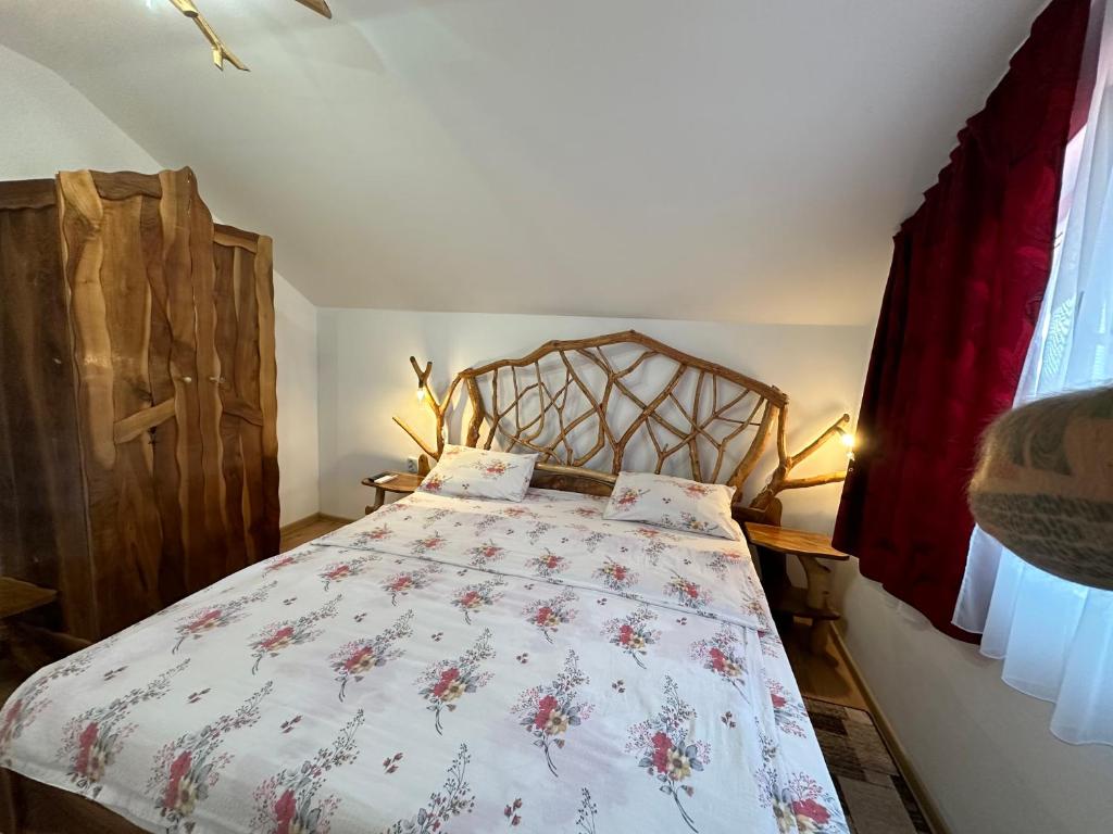 Postel nebo postele na pokoji v ubytování Casa Vlad