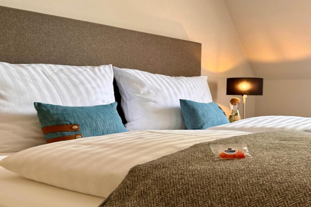 Postel nebo postele na pokoji v ubytování Auszeit Hotel Hamburg