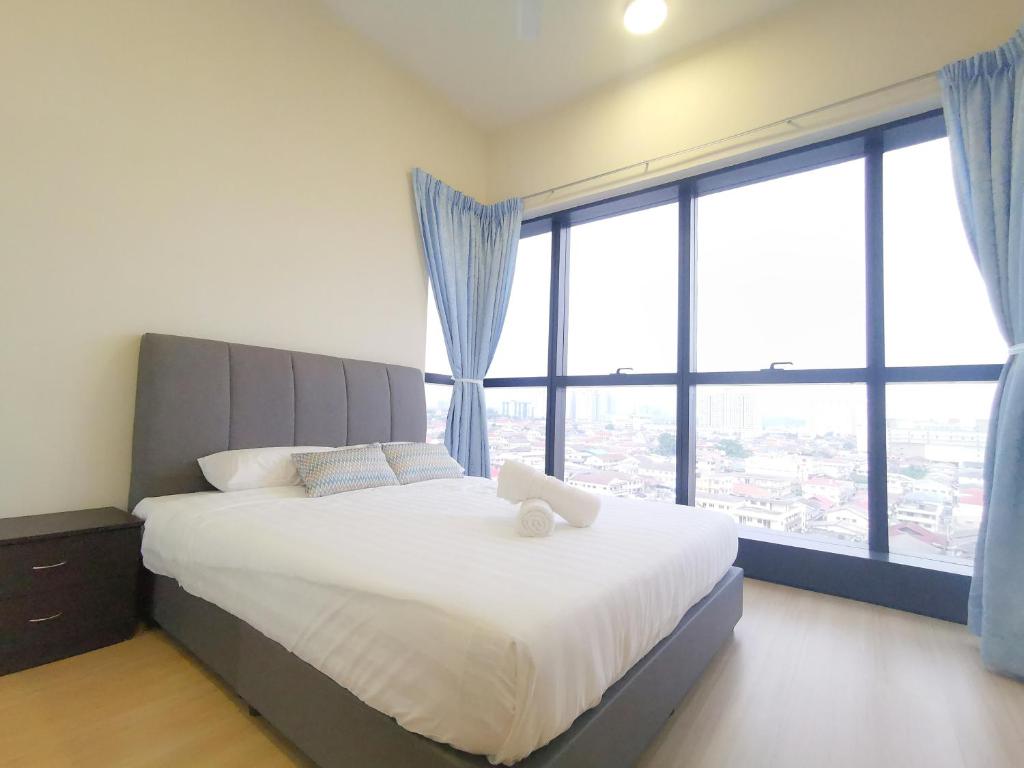 Ένα ή περισσότερα κρεβάτια σε δωμάτιο στο The Maaple Icon City Petaling Jaya