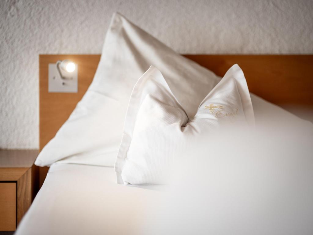Postel nebo postele na pokoji v ubytování Hotel Engel