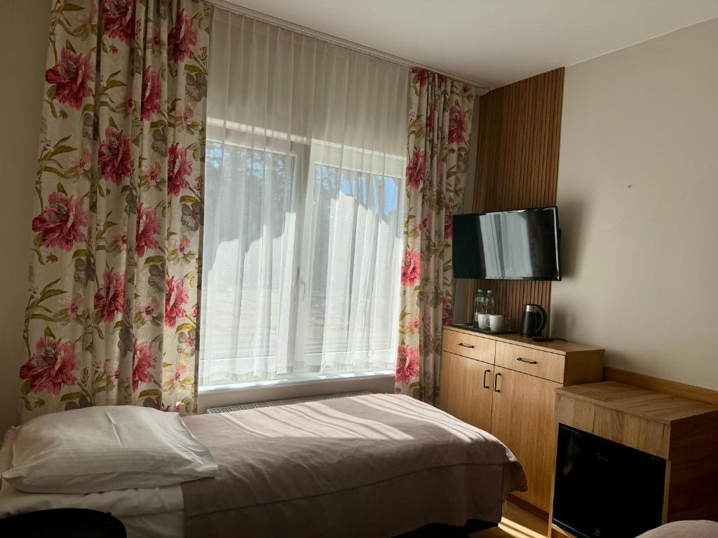 TV a/nebo společenská místnost v ubytování FOREST Family Resort Ustka