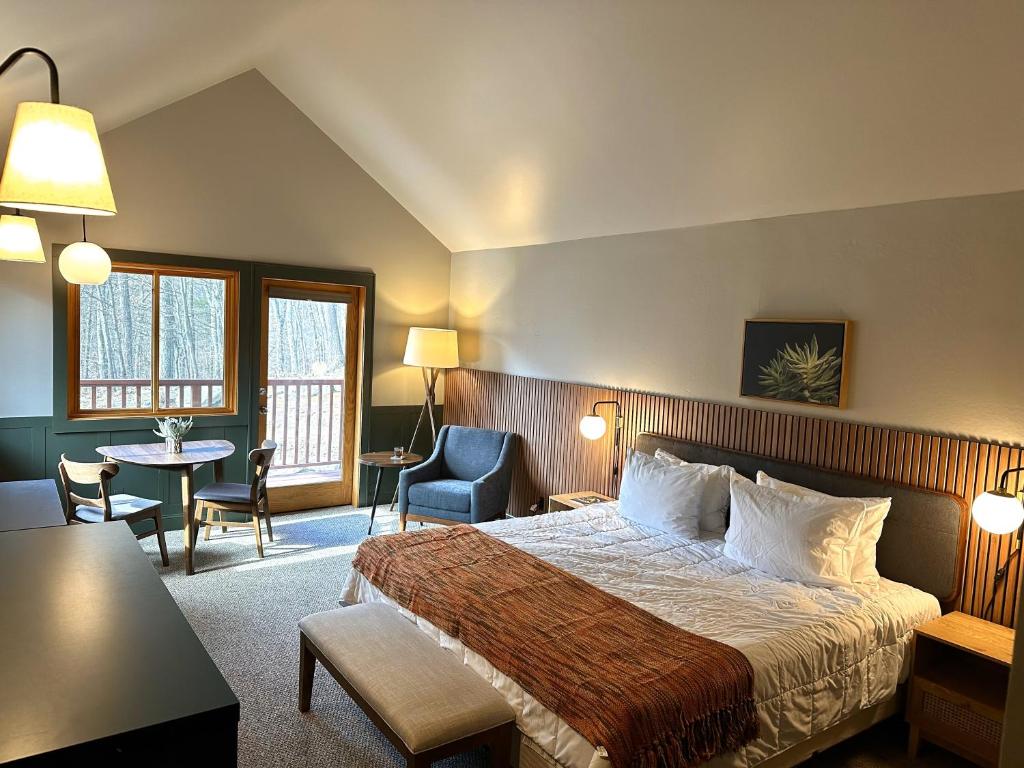 Voodi või voodid majutusasutuse Minnewaska Lodge toas