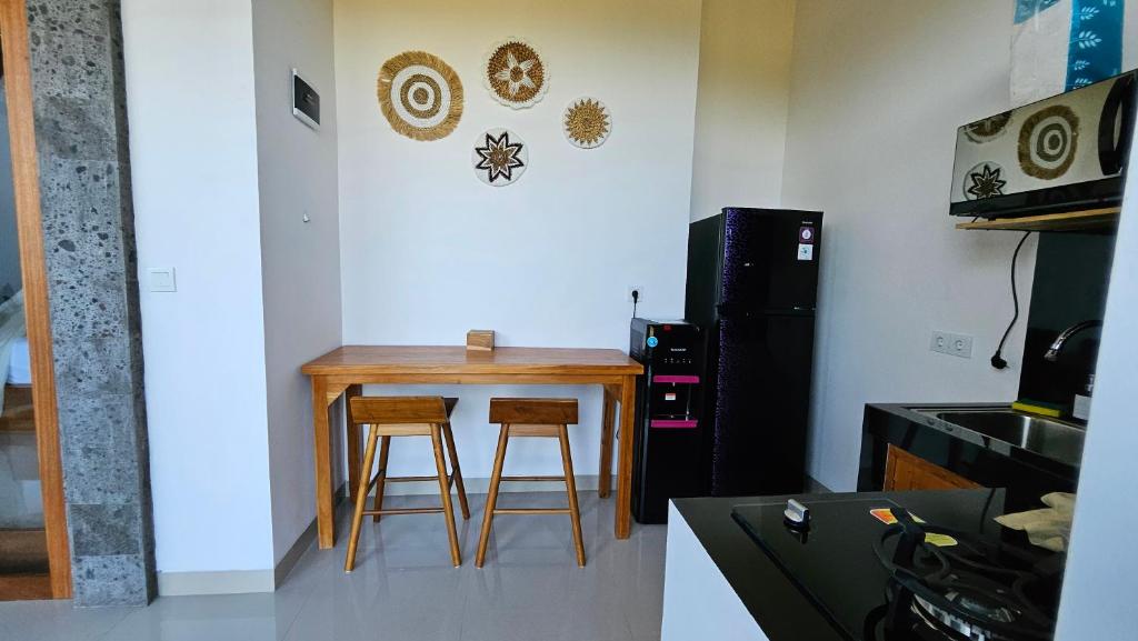 Kuchyň nebo kuchyňský kout v ubytování Weda Villas