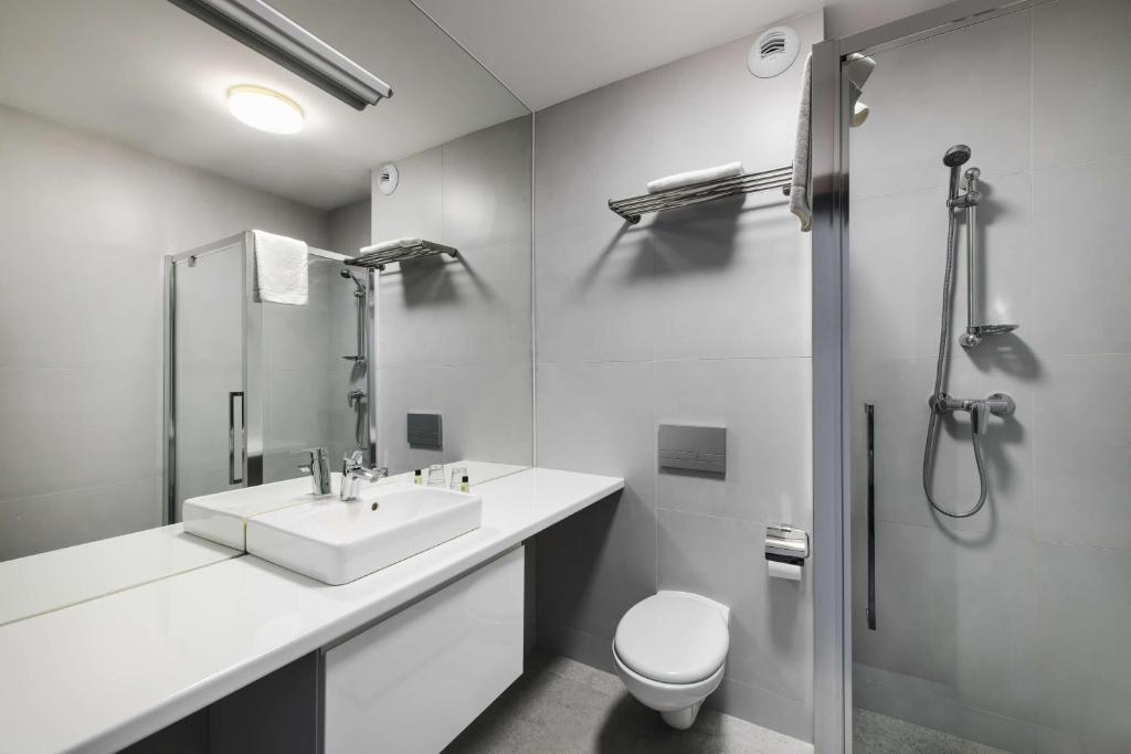 Ein Badezimmer in der Unterkunft Best Western Plus Hotel Olsztyn Old Town