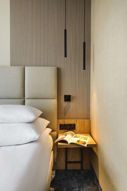 Ein Bett oder Betten in einem Zimmer der Unterkunft Best Western Plus Hotel Olsztyn Old Town