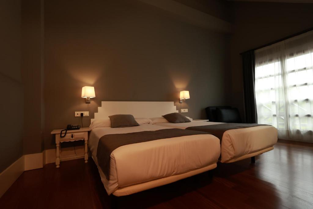 Posteľ alebo postele v izbe v ubytovaní Hotel The Park Derio