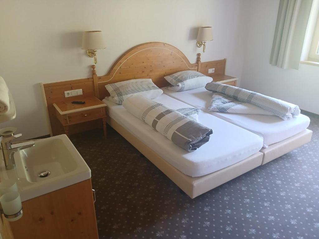 Postel nebo postele na pokoji v ubytování Goldmann, Haus