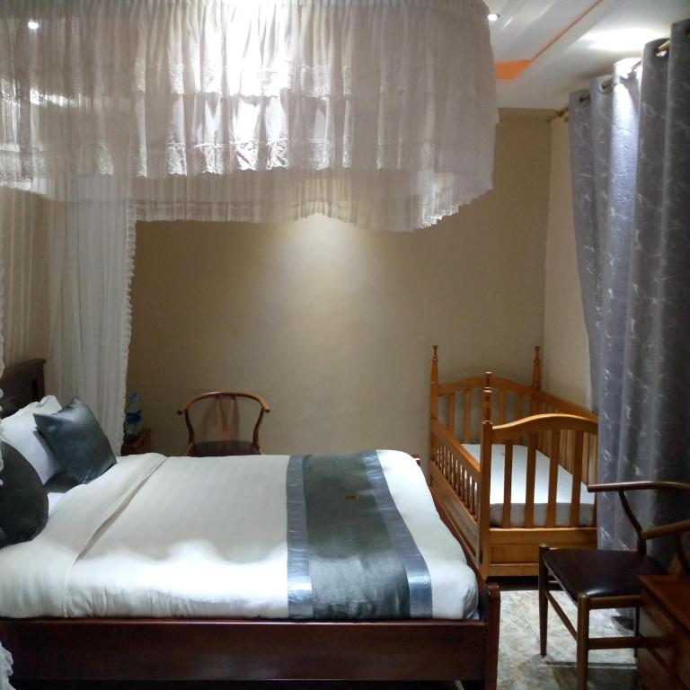 Postel nebo postele na pokoji v ubytování HOTEL ZEPTAN