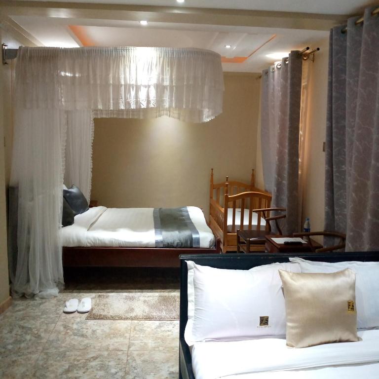 Postel nebo postele na pokoji v ubytování HOTEL ZEPTAN