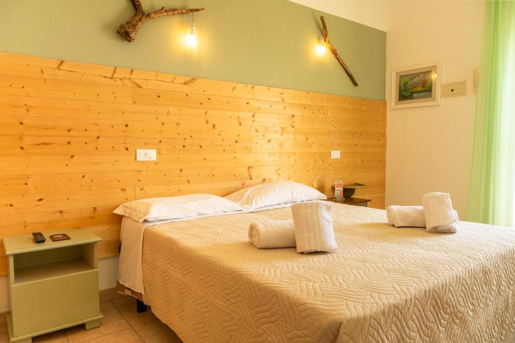 Posteľ alebo postele v izbe v ubytovaní Hotel Tokio Village - Azzurro Club