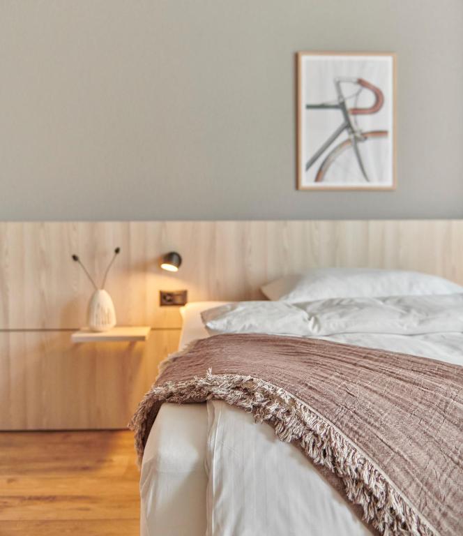 Postel nebo postele na pokoji v ubytování Hotel Balga Natur- und Bikehotel