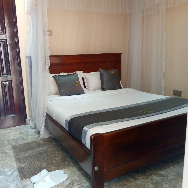 Postel nebo postele na pokoji v ubytování HOTEL ZEPTAN