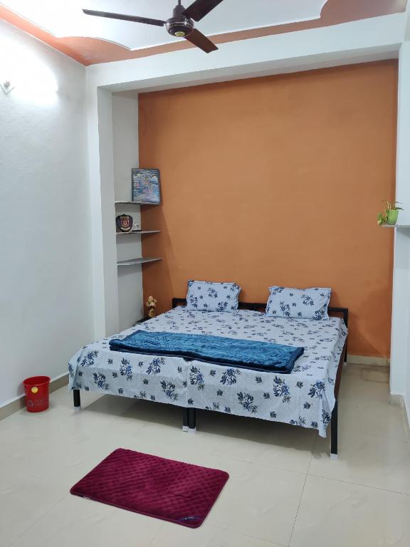 Voodi või voodid majutusasutuse Krishnaalay Guest House toas