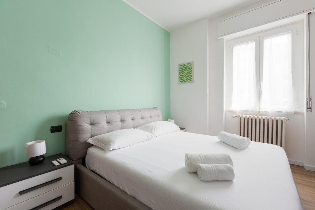 Ένα ή περισσότερα κρεβάτια σε δωμάτιο στο Corso Lodi Modern Apartment with Balcony