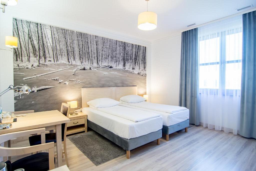 Posteľ alebo postele v izbe v ubytovaní Hotel Barczyzna Medical Spa