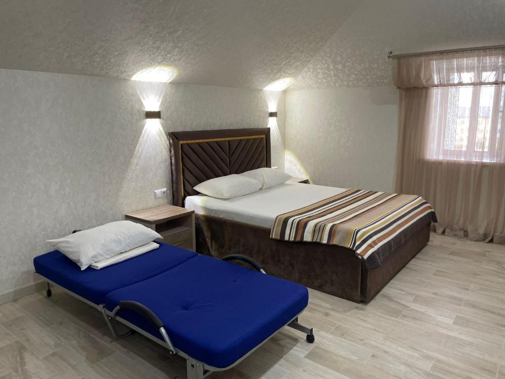 Гостинично-банный комплекс Майами Люкс - Luxe Drievoudige Kamer